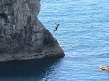Air ambulances land at Durdle Door after three people hurt themselves jumping off cliff