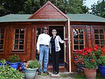 Couple must pull down their £10,000 summerhouse because planners say it is one metre too high 