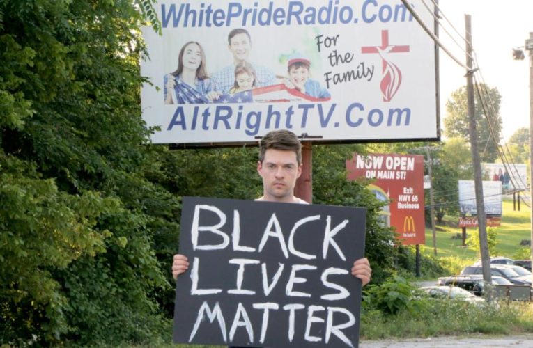 He held up a Black Lives Matter sign not far from KKK headquarters and recorded the reactions