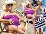 EXCLUSIVE Katy Perry cloaks her growing baby bump in a purple one-piece swimsuit with fiance Orlando
