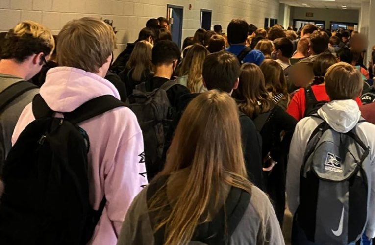 The Georgia student who posted the image showing a packed hallway and few visible masks was suspended