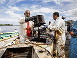 Mauritians race to contain catastrophic oil spill swamping island’s pristine beaches and coral reefs