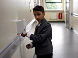 First pupils return to lessons in locked-down Leicester without masks
