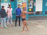 Semi-naked man brandishes huge SWORD outside Poundland in south London