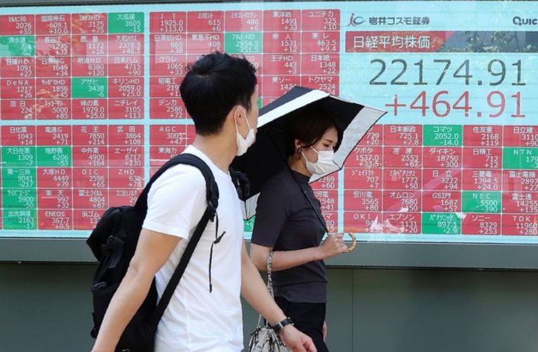Asian shares mixed on US-China tensions, Wall Street gains