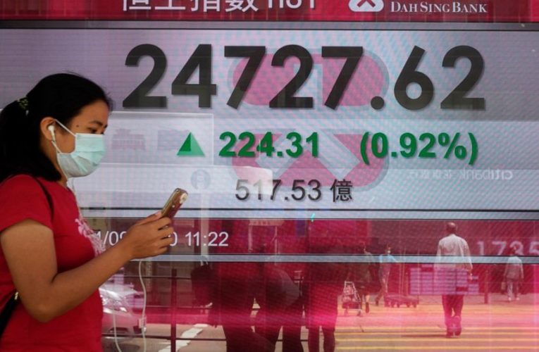 Stocks open higher on Wall Street following burst of deals