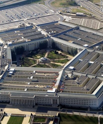 A top Coast Guard official who attended several meetings at the Pentagon tested positive, officials say