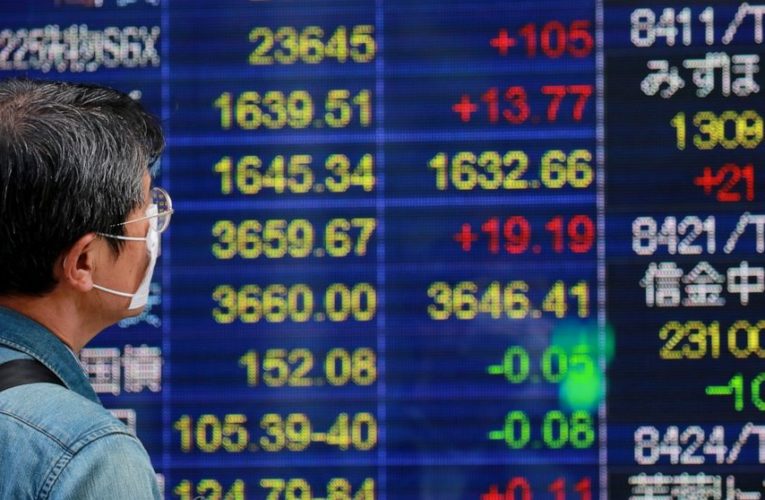 World shares mixed as investors eye U.S. economic aid talks