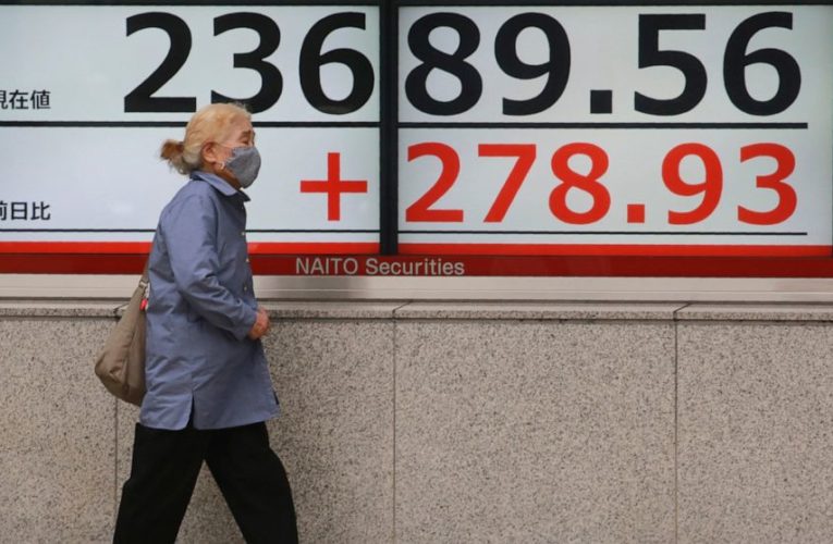 Stocks slip ahead of a busy week for company earnings news