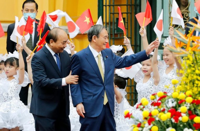 Japan, Vietnam agree to boost defense ties, resume flights