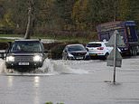 Flooding chaos as firefighters use boats to rescue stranded motorists in North Yorkshire