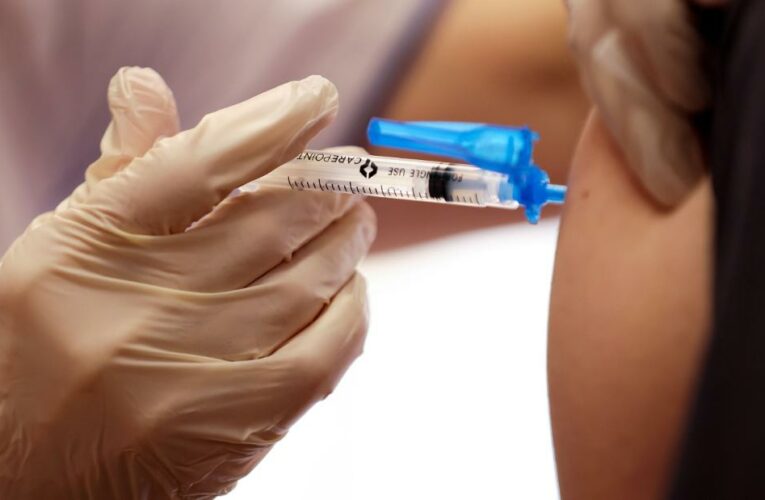 Opinion: A year into the pandemic, health care workers have a new source of hope