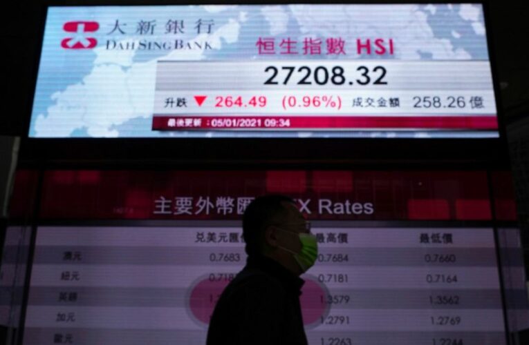Asian stocks mixed after Wall St retreat as virus cases rise