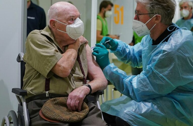 The Latest: Some Polish hospitals suspend vaccination