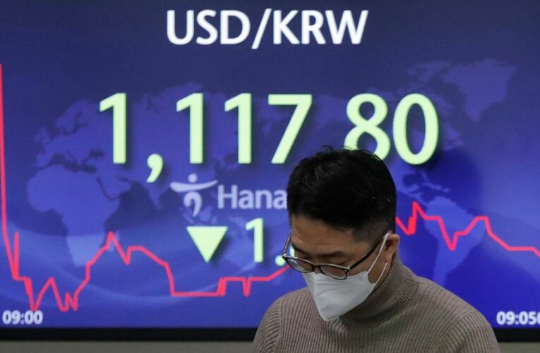 Asian stocks higher after Wall St. rises to new record