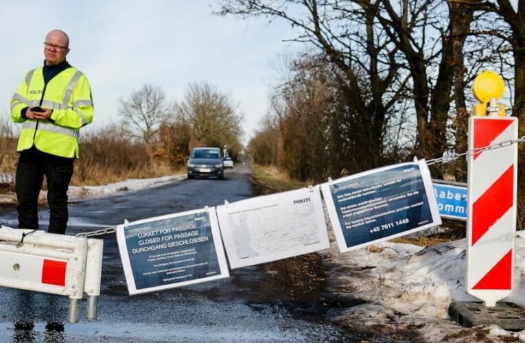 The Latest: Grieving Italians mark a COVID-19 anniversary