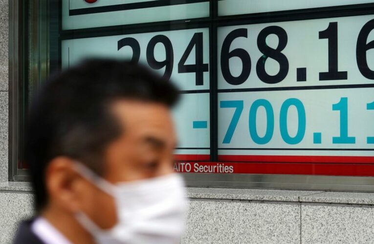 A bumpy day for stocks leaves indexes mixed; yields ease