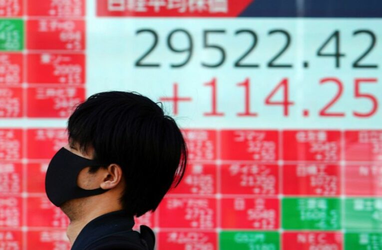 Stocks move mostly lower as bond yields resume their climb