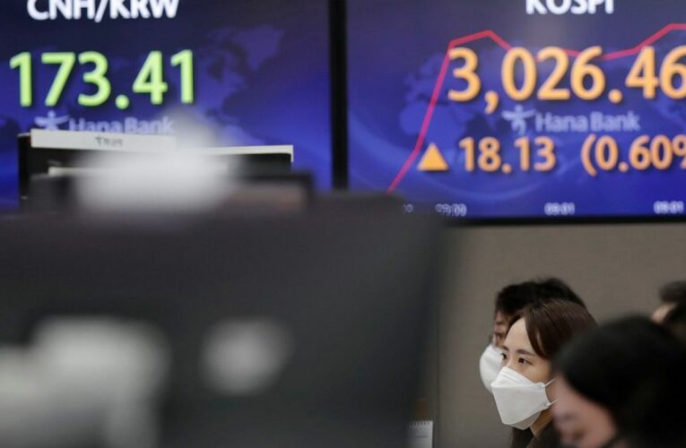 Banks, energy stocks lead indexes higher in early trading.
