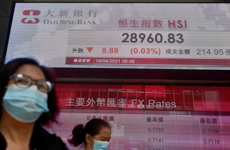 Stocks close lower, pulling indexes below record highs