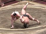 Horrific moment Sumo wrestler is thrown on to his head during a bout and dies