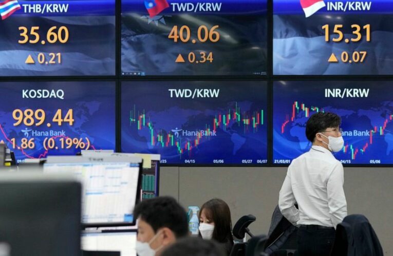 US stocks claw back much of an early loss and finish mixed
