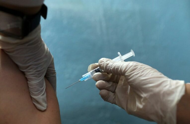 The Latest: Moscow orders mandatory vaccine jabs for many