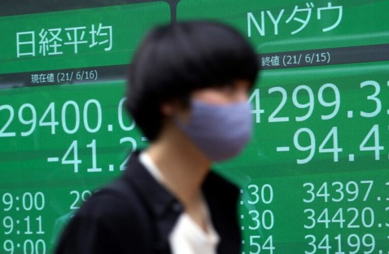 Stocks fall, yields rise as Fed sees hikes as soon as 2023