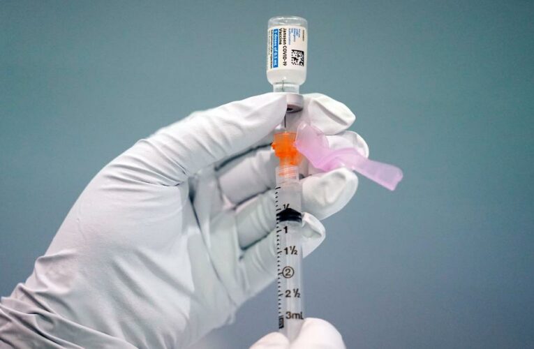Just 20 states have partially vaccinated 70% of US adults against Covid as the Delta variant spreads and people gather for holiday events