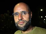 Son of Libyan dictator Gaddafi, 49, announces plans to unify nation he fled