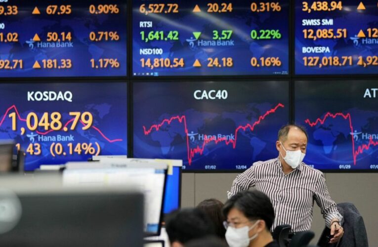 Global stocks sink after Fed discusses cut in US stimulus