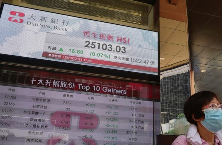 Stocks end mixed after Fed notes progress on the economy