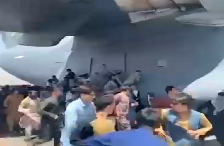 Video shows Afghans clinging to outside of US military plane as it takes off from Kabul