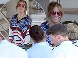 Jennifer Lopez is all smiles as she bids a fond farewell to the crew of her $130M yacht