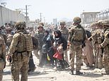 British troops helped last Afghan evacuee climb over a barbed wire fence into Kabul airport