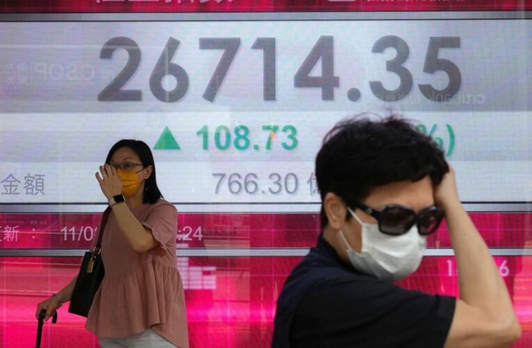 S&P 500, Dow industrials mark records but Nasdaq lags behind