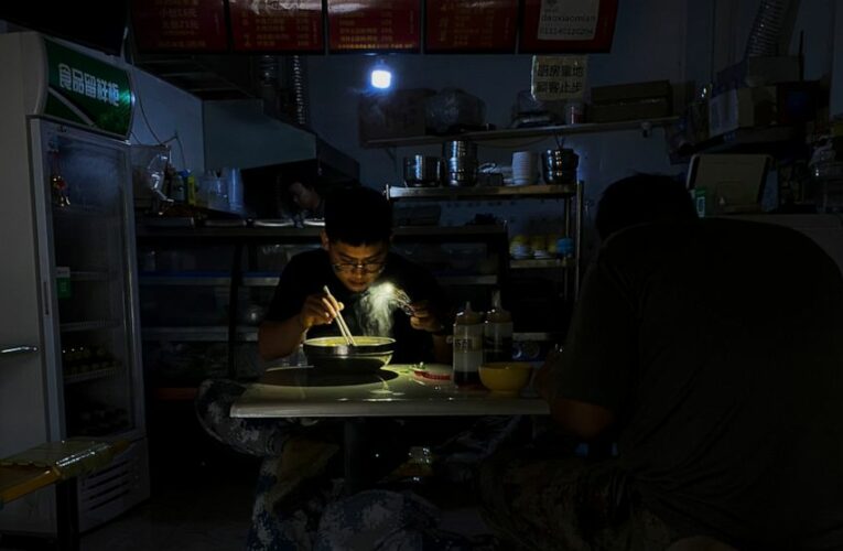 Chinese switch to flashlights, generators amid power cuts