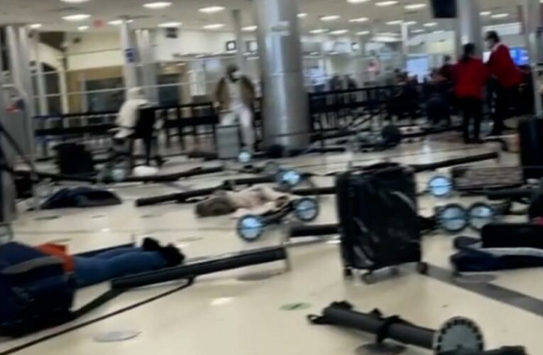 Warrants issued for man who fled from the Atlanta airport after a weapon discharged