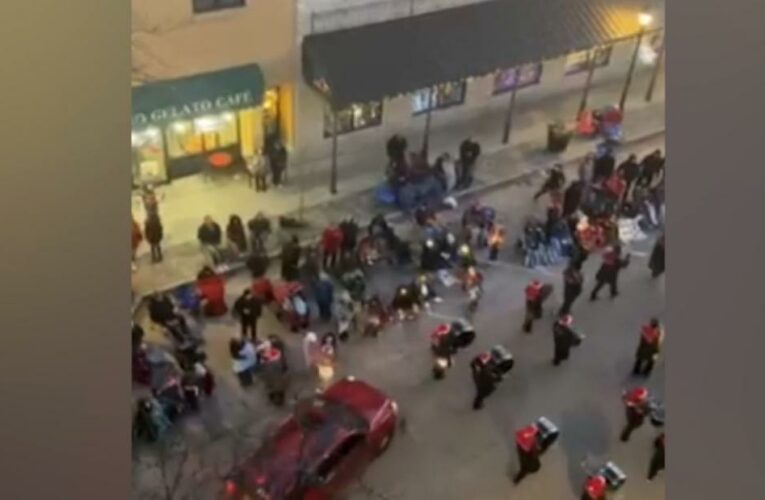 SUV strikes marching band on parade route