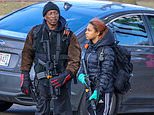 Armed father and daughter carrying AR-15s march alongside anti-Rittenhouse protesters