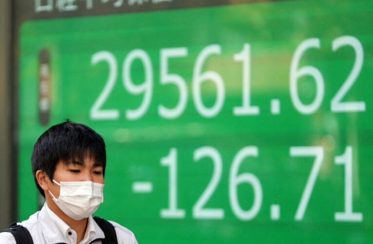 Asian shares press higher after Wall St record