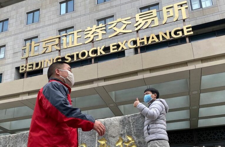 US stock indexes end wobbly day mostly lower on Wall Street