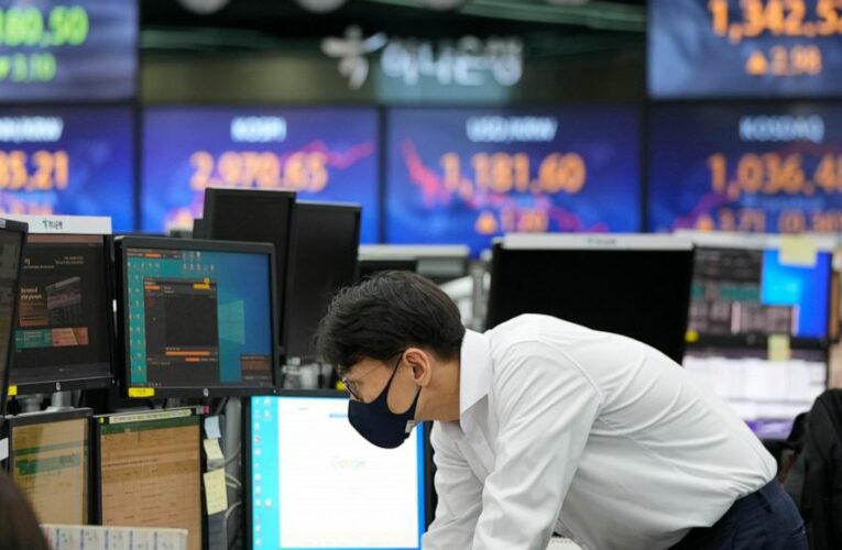 Asian shares press higher after Wall St record