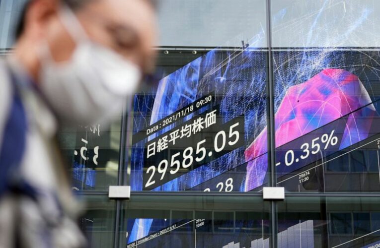 Stocks wobble on Wall Street as investors review earnings