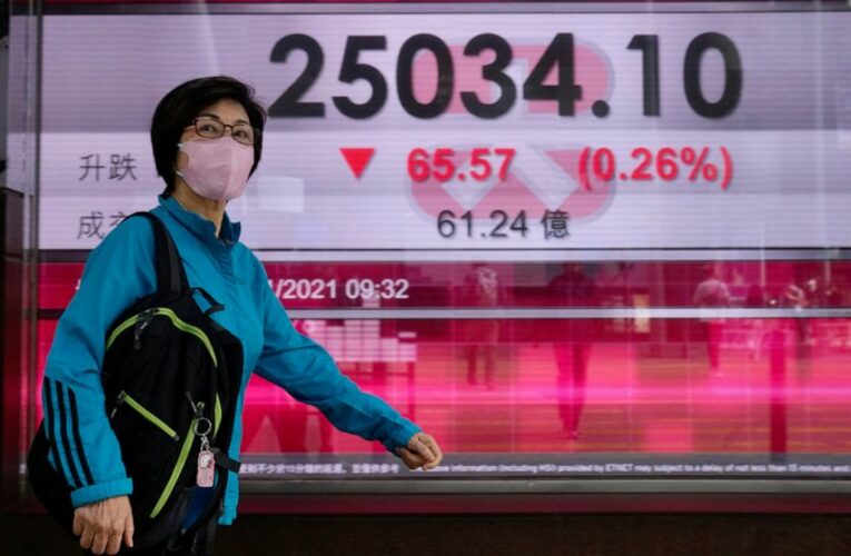 Stocks open lower on Wall Street, edging below record highs