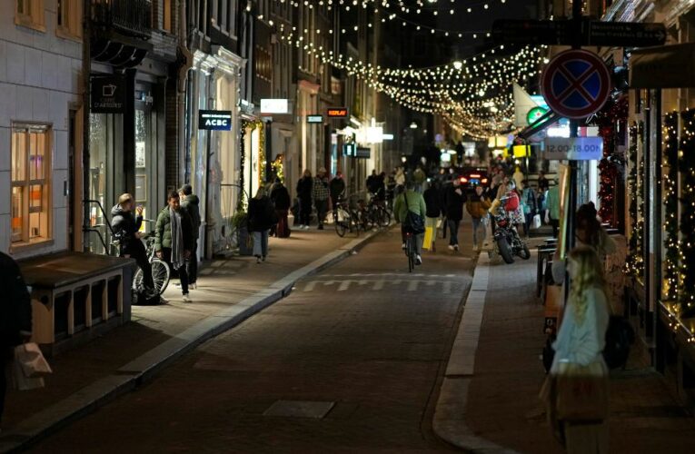 Netherlands reimposes strict lockdown and UK won’t rule out new measures over Omicron