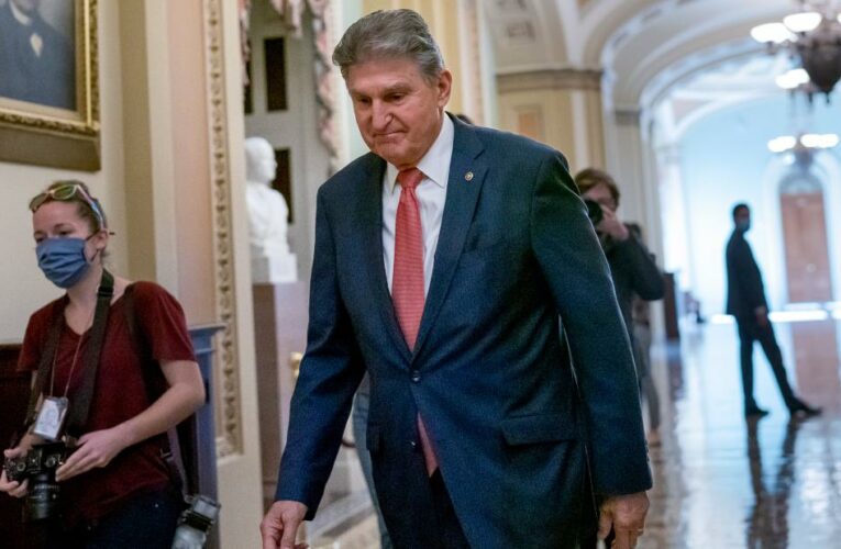 The financial group slashed the US outlook after the Democratic senator’s decision not to support President Biden’s Build Back Better bill