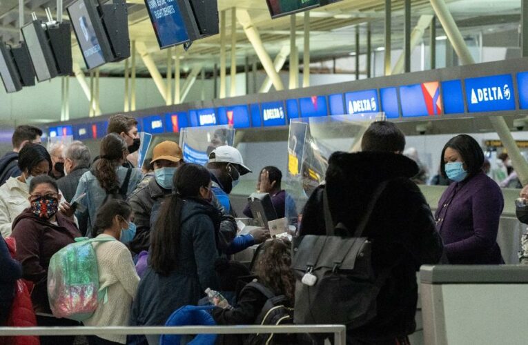 US airlines canceled hundreds more flights Sunday as staff and crew call out sick amid the Omicron surge