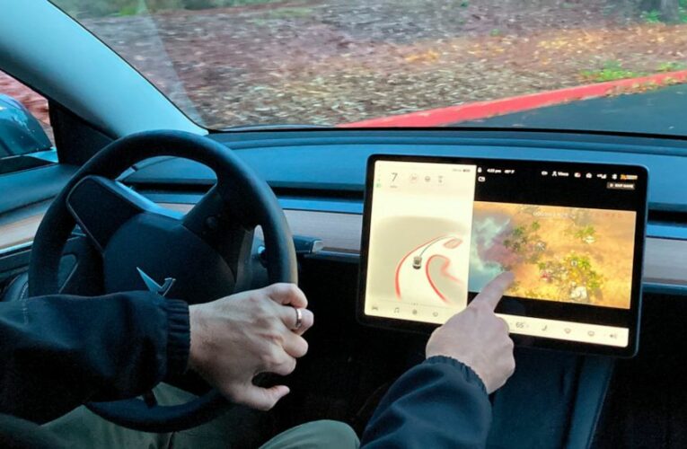 US opens probe into Tesla letting drivers play video games