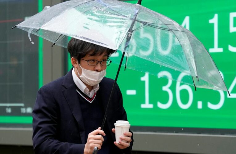 World shares mixed as markets await word from Fed meeting